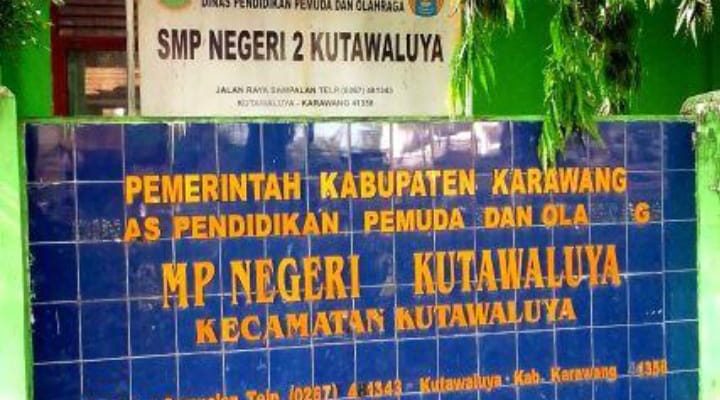 Caption : Gedung SMP Negeri 2 Kutawaluya, Kabupaten Karawang, menjadi sorotan menyusul mencuatnya dugaan tindak kekerasan terhadap seorang siswa yang diduga melibatkan dua oknum guru. Kasus tersebut kini menjadi perhatian publik dan diharapkan mendapat penanganan serta klarifikasi secara objektif dari pihak berwenang. (Foto: Istimewa) Caption : Gedung SMP Negeri 2 Kutawaluya, Kabupaten Karawang, menjadi sorotan menyusul mencuatnya dugaan tindak kekerasan terhadap seorang siswa yang diduga melibatkan dua oknum guru. Kasus tersebut kini menjadi perhatian publik dan diharapkan mendapat penanganan serta klarifikasi secara objektif dari pihak berwenang. (Foto: Istimewa)